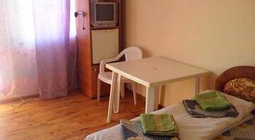 Фото номера Эконом 2-х местный с удобствами на несколько номеров Гостевой дом Mini Hotel Roza г. Заозёрное 10