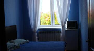 Фото номера Стандартный двухместный номер с 1 кроватью Гостиница Guest House Avalon г. Заозёрное 2