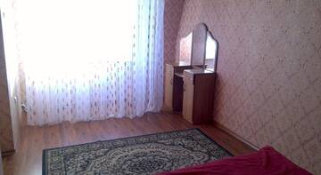 Фото номера Стандартный семейный номер Гостиница Guest House Avalon г. Заозёрное 3