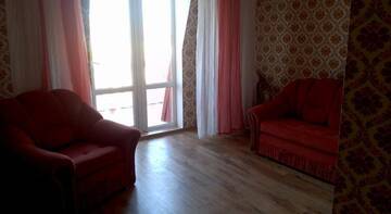 Фото номера Стандартный семейный номер Гостиница Guest House Avalon г. Заозёрное 8