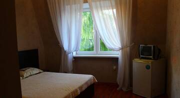 Фото номера Стандартный двухместный номер с 1 кроватью Гостиница Guest House Avalon г. Заозёрное 3