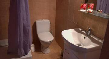 Фото номера Стандартный семейный номер Гостиница Guest House Avalon г. Заозёрное 5