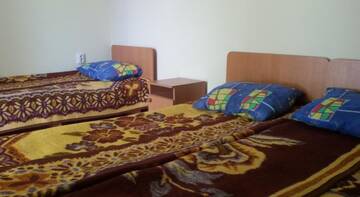 Фото номера Стандартный трехместный номер Гостевой дом Inn Almaz г. Заозёрное 5