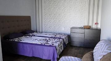 Фото номера Трехместный номер люкс Гостевой дом Дом на садовой 30 а г. Заозёрное 2