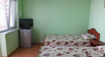 Фото номера Номер стандарт 3-4-х местный Пансионат Онега г. Заозёрное 3