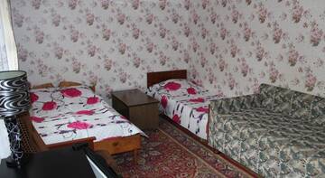 Фото номера Стандартный четырехместный номер Гостиница Melrose Hotel г. Заозёрное 2