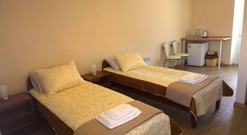 Фото номера Апартаменты с душем Гостиница Guest house Olimpiya г. Заозёрное 4