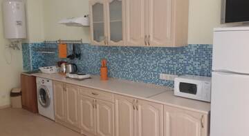 Фото номера Апартаменты с душем Гостиница Guest house Olimpiya г. Заозёрное 9