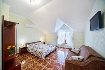 Фото номера Четырехместный номер &amp;quot;Комфорт&amp;quot; Гостиница Guest House Miry Mir г. Заозёрное 6