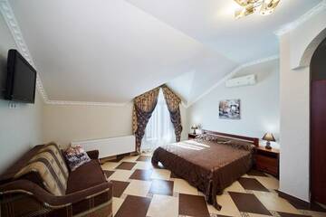 Фото номера Четырехместный номер &amp;quot;Комфорт&amp;quot; Гостиница Guest House Miry Mir г. Заозёрное 4